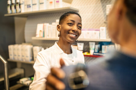 Pharmacist consulting a patient